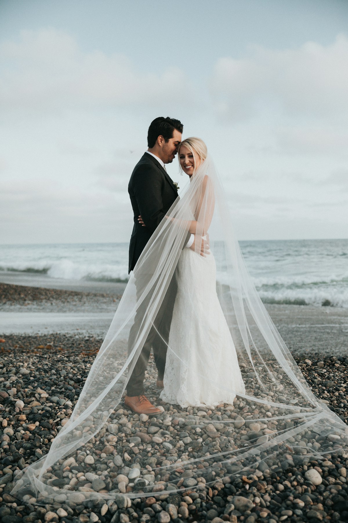 Romantic wedding couple portrait on the beach